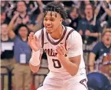  ?? JUSTIN CASTERLINE/GETTY IMAGES ?? The Illini (with Terrence Shannon Jr.) are a team with two identities.