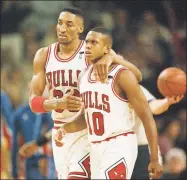  ?? John Swart / Associated Press ?? The Chicago Bulls Scottie Pippen, left, and B.J. Armstrong walk up court during a break in the action in a 1994 playoff game against the New York Knicks.