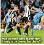  ??  ?? Max Biamou scores against Notts County in the League Two play-offs