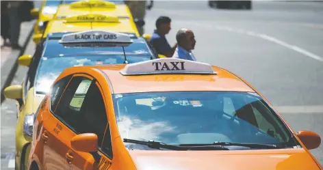  ?? GERRY KaHRMANN ?? B.C. Taxi Associatio­n members will meet today to decide if they will file a petition in court against provincial ride-hailing policies.