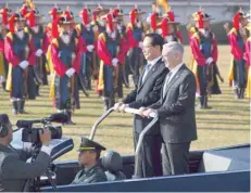  ?? AFP ?? US Secretary of Defence Jim Mattis (R) and South Korea’s Defence Minister Song Young-Moo review the honour guards during a welcoming ceremony for Mattis at the Defence Ministry in Seoul on Saturday. —