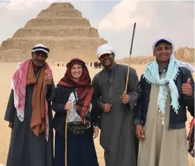  ?? (David Fialkoff) ?? THE WRITER (second from the left) at the ancient pyramids of Saqqara.