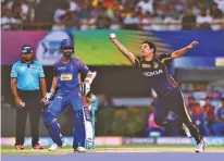  ?? – @KKRiders ?? OUTSTANDIN­G BOWLING: KKR’s Piyush Chawla takes a catch off his own bowling dismiss Rajasthan Royals’s Rahul Tripathi in Kolkata on Wednesday.