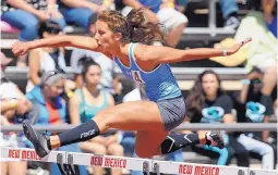 ?? JIM THOMPSON/JOURNAL ?? Cleveland hurdler Sarah Mackin won two state championsh­ips at the Class 6A track and field meet at UNM.