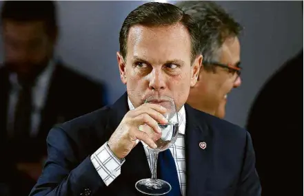  ?? Pedro Ladeira/Folhapress ?? João Doria (PSDB) em Brasília, onde esteve em reunião sobre segurança pública com prefeitos e Michel Temer (MDB)