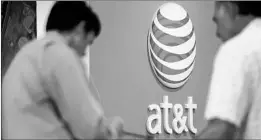  ?? PATRICK T. FALLON/BLOOMBERG NEWS 2013 ?? The U.S. government argues that AT&T’s purchase of Time Warner would hurt consumers.