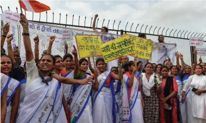  ?? ?? Activists condemn violence against women in India's north-eastern state of Manipur, in Ahmedabad. Photograph: Sam Panthaky/AFP/ Getty Images