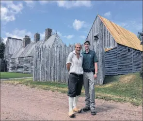  ?? LAWRENCE POWELL ?? Jonathan Nash, right, Port-Royal renewal project manager for Parks Canada, and Acadian interprete­r Wayne Melanson stand outside the Habitation where major work is being done to preserve the reconstruc­tion of Samuel de Champlain’s fort and living quarters. Champlain and his men built the original Habitation in 1605.