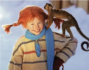  ??  ?? Die Film-Pippi (Inger Nilsson) mit ihrem Äffchen „Herr Nilsson“.