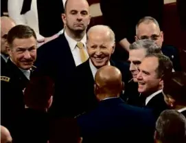  ?? ANDREW CABALLERO-REYNOLDS/AFP VIA GETTY IMAGES ?? President Biden greeted attendees following his State of the Union speech Tuesday night.