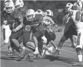  ?? ROB SCHUMACHER/THE REPUBLIC ?? Horizon running back Morgan Alexander runs for a touchdown against Sunnyslope.