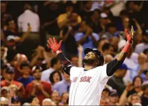  ?? Elise Amendola / Associated Press ?? Boston Red Sox designated hitter David Ortiz reacts as he crosses home plate after hitting a two-run home run during the sixth inning against the Baltimore Orioles in 2015.