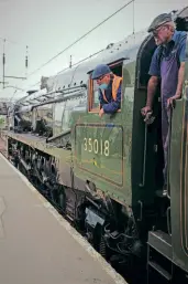  ??  ?? Right: Top link men of today – driver Mick Kelly and fireman Martyn Soames on No. 35018 at Carlisle on June 8. SANDY SMEATON