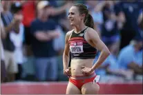  ?? ASHLEY LANDIS — THE ASSOCIATED PRESS ?? Jenny Simpson smiles despite a 10th-place finish in the finals of the women’s 1,500-meter run Monday at the U.S. Olympic Track and Field Trials in Eugene, Ore.