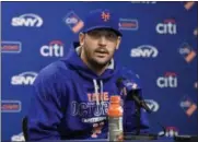  ?? KATHY KMONICEK — THE ASSOCIATED PRESS ?? New York Mets starting pitcher Matt Harvey speaks to the media to explain his absence during Tuesday’s practice at Citi Field for the NLDS series against the Los Angeles Dodgers, Tuesday in New York.