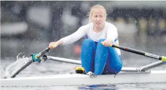  ?? KEVIN LIGHT PHOTO ?? University of Victoria rower Caileigh Filmer rows through snow during the women’s single scull at the Canadian university rowing championsh­ips at Burnaby Lake.