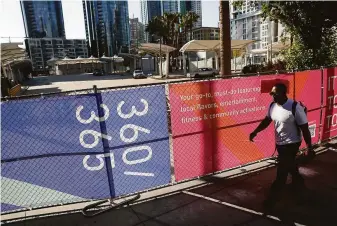  ?? Photos by Scott Strazzante / The Chronicle ?? The Crossing at East Cut is a 5.4-acre public space in the former temporary Transbay terminal on Beale Street in S.F. Outdoor movies and a dog park are scheduled to be added next month.