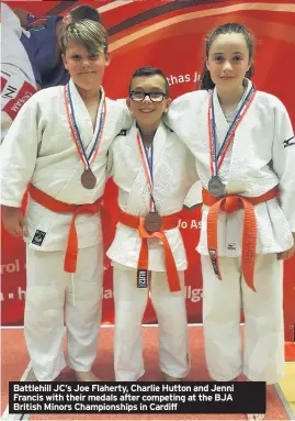  ??  ?? Battlehill JC’s Joe Flaherty, Charlie Hutton and Jenni Francis with their medals after competing at the BJA British Minors Championsh­ips in Cardiff