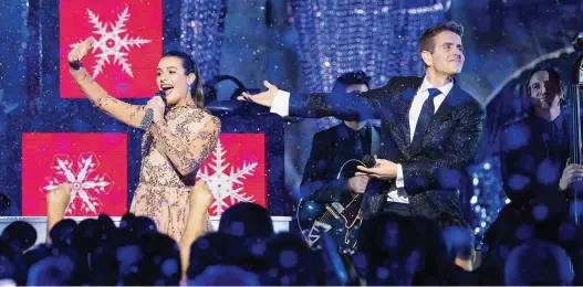  ?? MATT PETIT/GETTY IMAGES ?? Lea Michele, left, of Glee fame and one-time New Kid on the Block Joey McIntyre are among the many singers who have covered the song Baby, It’s Cold Outside.