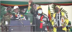  ?? ?? President Mnangagwa introduces the candidate for Mbizo constituen­cy, Cde Vongaiishe Mupereri(centre) and Cde John Mapurazi (right) who is representi­ng Kwekwe Central