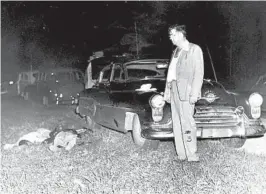  ?? STATE ARCHIVES OF FLORIDA ?? in 1951, on a roadside near Umatilla, Samuel Shepherd and Walter Irvin were shot by Lake County Sheriff Willis V. McCall, standing. Shepherd died and Irvin survived though he was shot in the cheek, neck and chest.