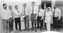  ??  ?? Ninewells Hospital Director Admin and Logistics Maj. Gen. Sri Ranaweera exchanges MOU with Ceylon Biscuits CEO Nalin Karunaratn­e