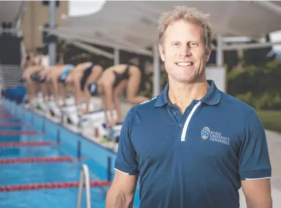  ?? Picture: CAVAN FLYNN. ?? Bond University head swimming coach Richard Scarce puts his elite squad through their paces.