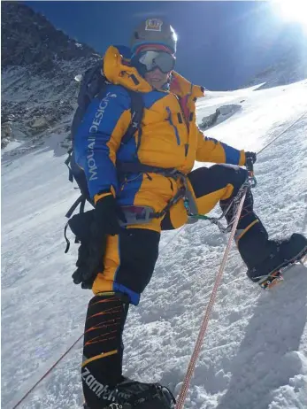  ?? PHOTO: CONTRIBUTE­D ?? ON TOP OF THE WORLD: Toowoomba’s Alyssa Azar on her way to reaching the summit of Mt Everest for the first time last year.