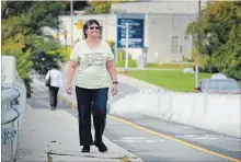  ?? JOHN RENNISON THE HAMILTON SPECTATOR ?? Anita Joldersma has walked more than 2,400 miles in Hamilton. Her quest to stroll every street took four years and four pairs of shoes.
