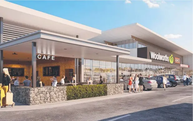  ?? Pictures: SUPPLIED ?? VISION: An artist's impression of the Woolworths outlet proposed for the corner of the Captain Cook Highway and Trinity Beach Rd.