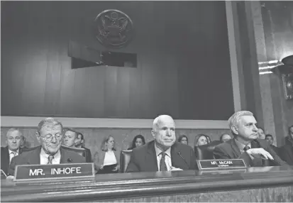  ?? JACK GRUBER/USA TODAY ?? Sen. John McCain, R-Ariz., center, is pushing for the creation of a select committee to investigat­e Russian interferen­ce in the election.