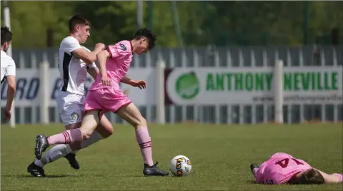  ??  ?? Daniel Madaghjian of Bray Wanderers challenges Brody Murphy of Wexford FC.