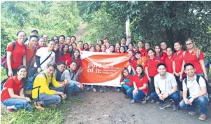  ??  ?? The firm’s Corporate Social Responsibi­lity team helps keep PwC Philippine­s’ commitment to protect the environmen­t by greening the PwC Forest, a tract of land in Barangay Calawis, Antipolo City.