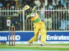  ?? Ahmed Ramzan/ Gulf News ?? Andre Fletcher of Pakhtoons gets aggressive against Bengal Tigers during the T10 League at the Sharjah Cricket Stadium yesterday.