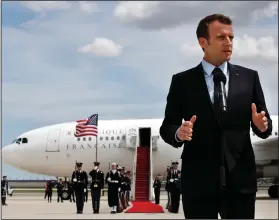  ?? AP Photo/Jacquelyn Martin ?? French president: French President Emmanuel Macron speaksa on arrival at Andrews Air Force Base, Md., Monday, outside of Washington. President Trump, celebratin­g nearly 250 years of U.S.-French relations, will be hosting Macron at a glitzy White House...