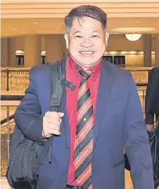  ?? – Bernama photo ?? Dr Ting arrives at the Federal Court in Putrajaya. A nine-member bench later ruled in a 7-2 majority decision that the DUN had the power to disqualify him as Pujut assemblyma­n over his dual citizenshi­p status.