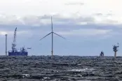  ?? JULIA NIKHINSON / ASSOCIATED PRESS ?? The South Fork Wind farm turbine, east of Montauk Point, N.Y., is the U.S.’s first commercial-scale offshore wind farm.