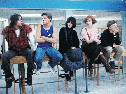  ?? UNIVERSAL PICTURES ?? Judd Nelson, left, Emilio Estevez, Ally Sheedy, Molly Ringwald and Anthony Michael Hall in a scene from John Hughes’ iconic film about high school cliques, The Breakfast Club. “How are we meant to feel about art that we both love and oppose?” Ringwald...