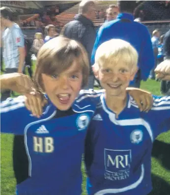 ?? ?? Harrison is pictured with friend and former Wisbech St Mary team mate William Pentelow