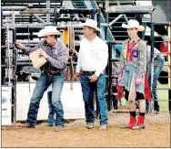  ?? MARK HUMPHREY ENTERPRISE-LEADER ?? Profession­al rodeo announcer Brandon Wren , of Haskell, Okla., (left), stands ready for the chute to open while announcing a bucking event during the 64th annual Lincoln Rodeo in 2017. Wren was named American Cowboys Rodeo Associatio­n...