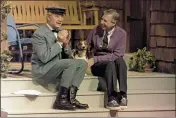  ?? GENE J. PUSKAR — THE ASSOCIATED PRESS ?? Fred Rogers talks with David Newell, a.k.a. Speedy Delivery’s Mr. McFeely, during a rehearsal of his television program “Mister Rogers’ Neighborho­od” in Pittsburgh.