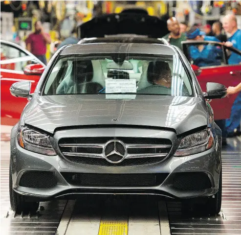  ?? ANDREW CABALLERO-REYNOLDS / AFP / GETTY IMAGES FILES ?? The American auto industry has warned that possible tariffs of up to 25 per cent on millions of imported cars and parts would devastate the economy, a concern that is also shared by some Republican lawmakers.