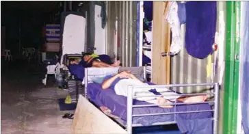  ?? GETUP/AFP ?? Refugees rest on the bunks at the Australian detention centre on Manus Island in Papua New Guinea earlier this month .