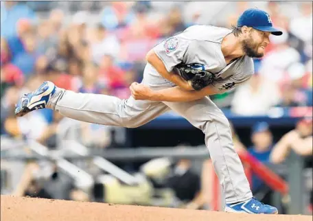  ?? Scott Cunningham Getty Images ?? AFTER GOING 72⁄3 strong innings against the Braves, Clayton Kershaw has a 2.23 ERA in seven starts since returning from injuries.