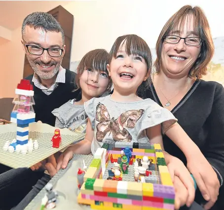  ?? Picture: Kami Thomson. ?? The Woollacott family from Johnshaven have won a trip to Denmark to stay in a house made of Lego.