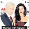  ??  ?? Michael with his wife Catherine Zeta-Jones