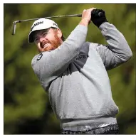  ?? AP/RYAN KANG ?? J.B. Holmes hits his tee shot on the fourth hole during the final round of the Genesis Open on Sunday at the Riviera Country Club in Los Angeles. Holmes rallied from a four-shot deficit in the final round for his first victory in three years.