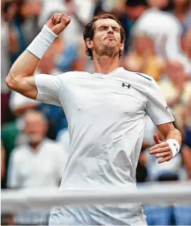 ?? Glyn Kirk / AFP/Getty Images ?? Defending champion Andy Murray of Britain savors his hard-fought 6-2, 4-6, 6-1, 7-5 third-round victory over Italy’s Fabio Fognini on Friday.