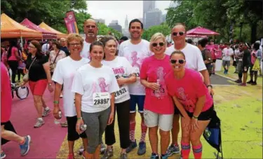  ??  ?? Ann Lewis and the support team of family and friends for her and her mother at the 25th Komen Philadelph­ia Race for the Cure in 2015. Ann and her mother, Barbara Clingan, are seen in pink.