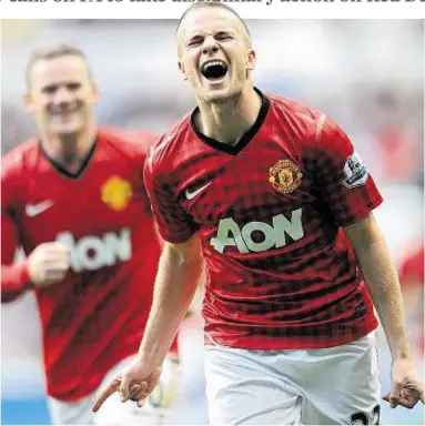  ??  ?? THREE AND EASY: Tom Cleverley celebrates after making it 3-0 to Manchester United at St James’s Park